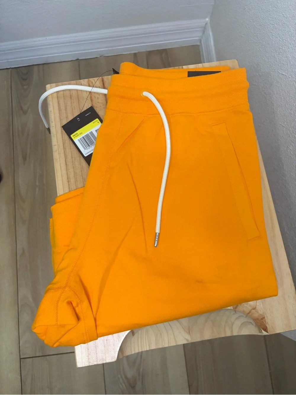 Nike Bright Orange Athletic Shorts with White Swoosh Tag